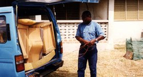 My friend Bright, loading up the van for a trip to Sekondi.