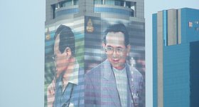 The King of Thailand is much revered, and his image is everywhere in Bangkok. This image occupies 14 stories of a building.